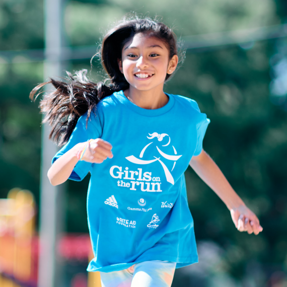 Girls on the Run participant wearing blue shirt running